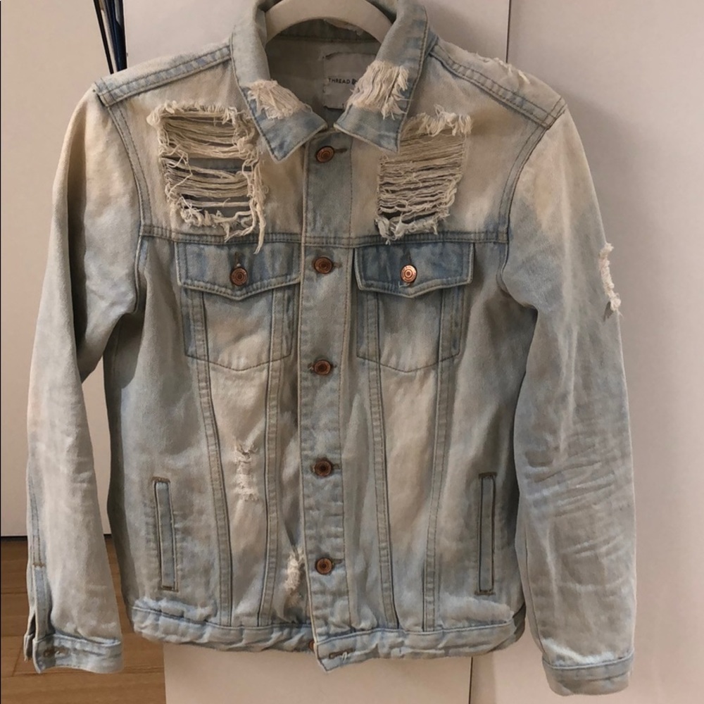 Distressed light denim jacket